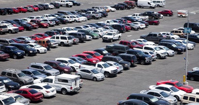 Cars Parked in Parking Lot. Buying a car at auction.