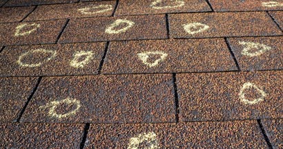 Insurance Adjuster Marked Roof With Hail Damage. Does Home Insurance Always Cover Hail Damage?