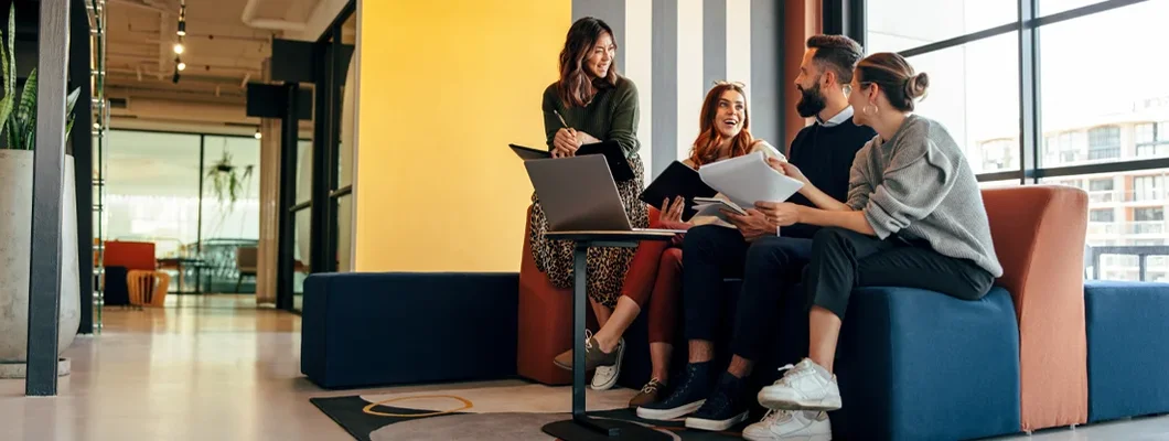 Business people working in an office lobby. Business Insurance in Swarthmore, Pennsylvania.