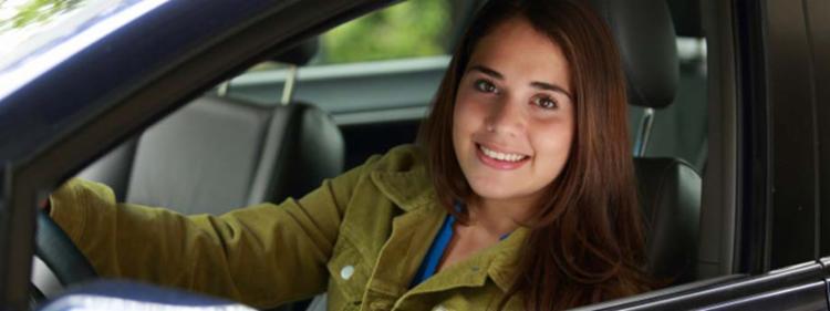 Teen girl in new car