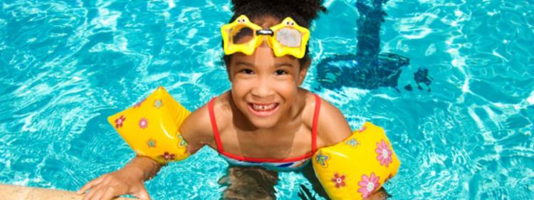 Little girl practicing pool safty