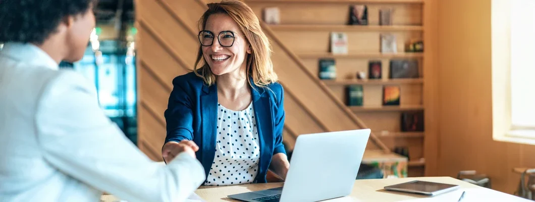 Business people shaking hands in the office. Independent Insurance Agents: What Are They and What Do They Do?
