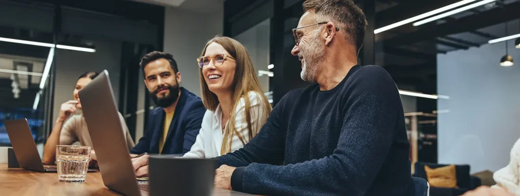 Group of businesspeople having a briefing. Find West Point, Utah business insurance.