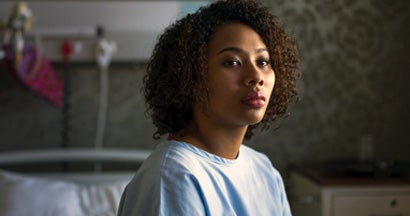 Thoughtful female patient sitting at hospital. How long does group short term disability last.