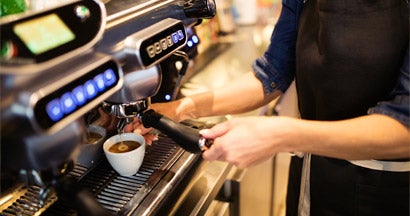 Coffee shop business owner working at coffee shop