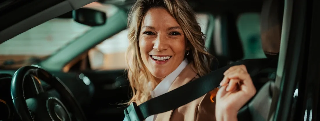 Woman securing seatbelt preparing for a drive in her car. What is Bodily Injury Liability? 