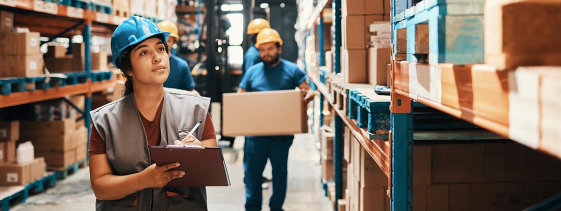 Close up of a female worker working in a warehouse. Does Your Business Need Trade Credit Insurance?