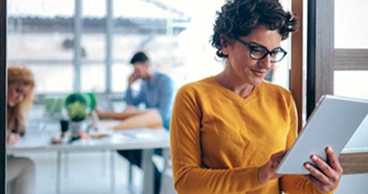 Woman using tablet in the office