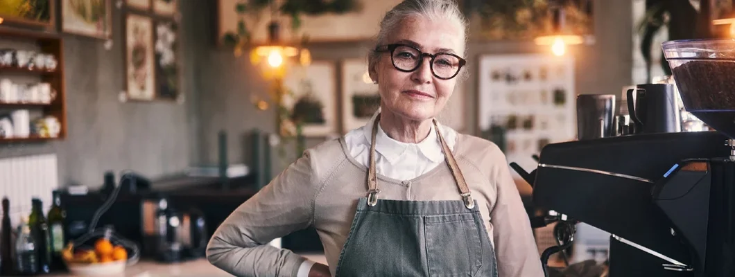 Senior woman standing alone in her shop during the day. Business Insurance in Williston, North Dakota.