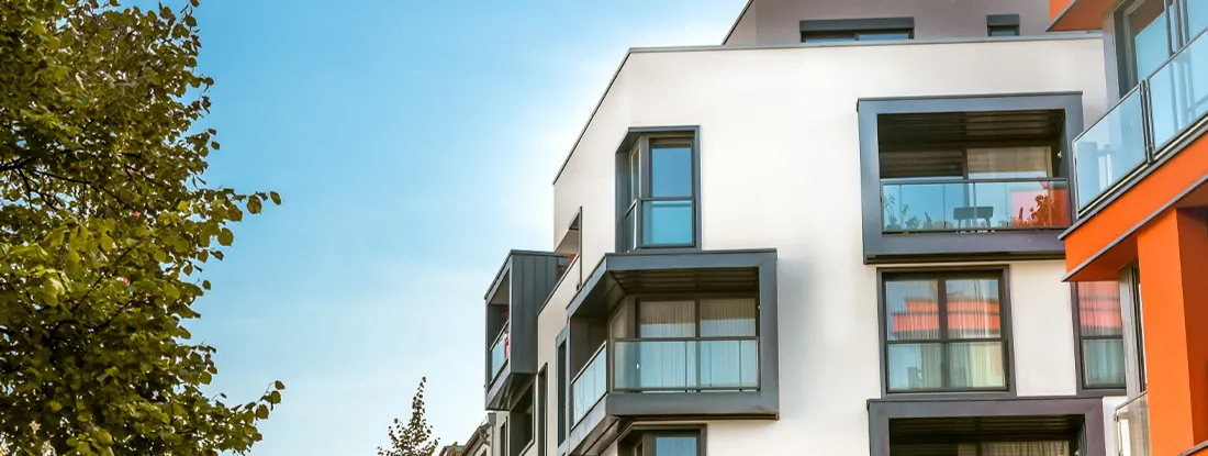 Modern condominium buildings. How Much Condo Insurance Do I Need in 2026?