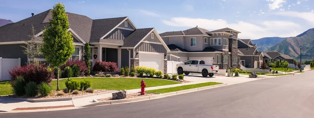 A street of modern houses in a development south of Salt Lake City in Utah. How to File Umbrella Insurance Claims.