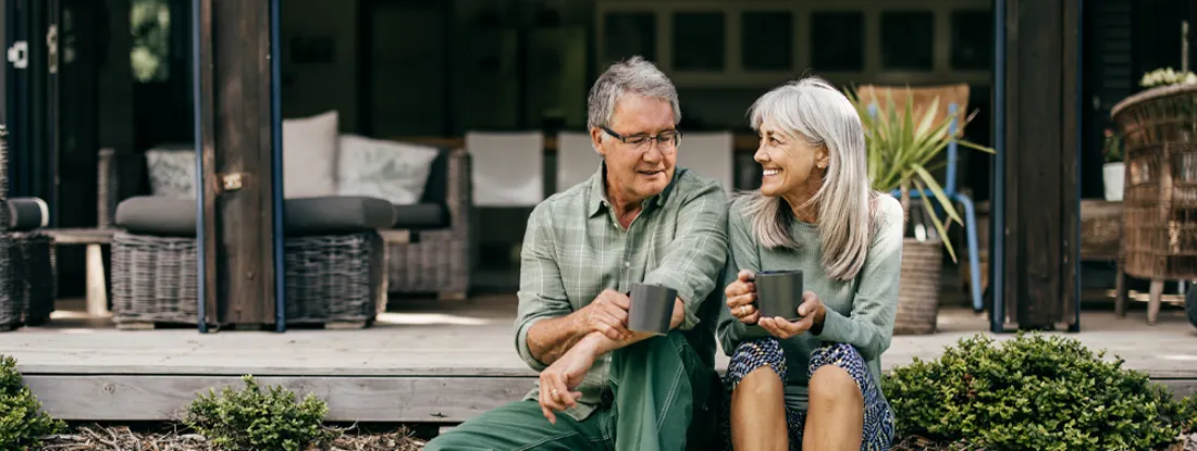 Couple in their 60s embracing a quiet moment. Life Insurance vs. Accidental Death and Dismemberment.