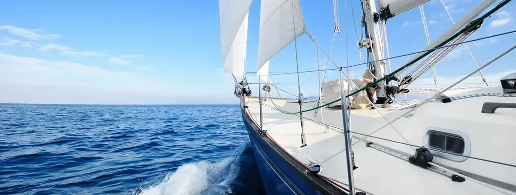 Detail of sailing yacht during voyage. Find Hawaii Boat Insurance.
