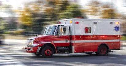 Ambulance in motion. Accidental Death and Dismemberment.