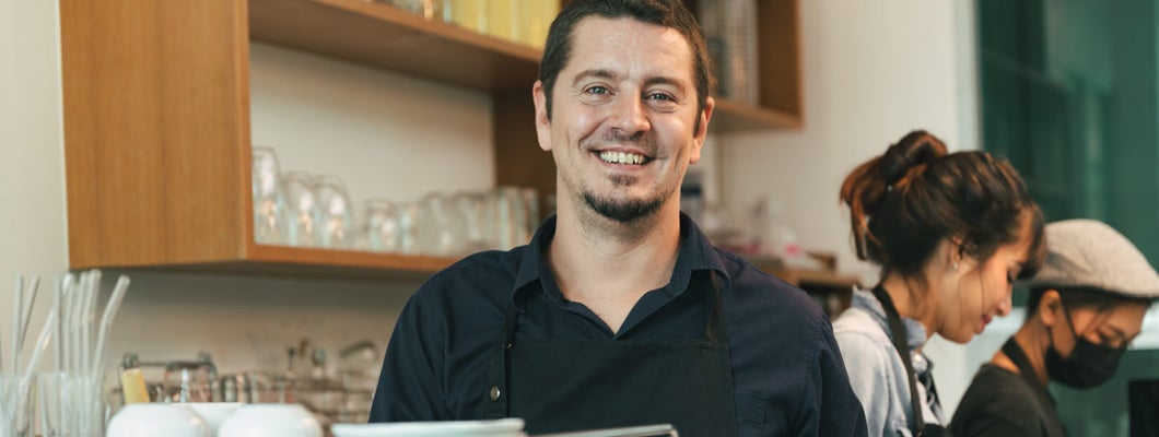 Coffee shop owner in coffee shop. Find Independence, Kentucky business insurance.