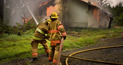 Firefighers and housefire. Find Fire Insurance.