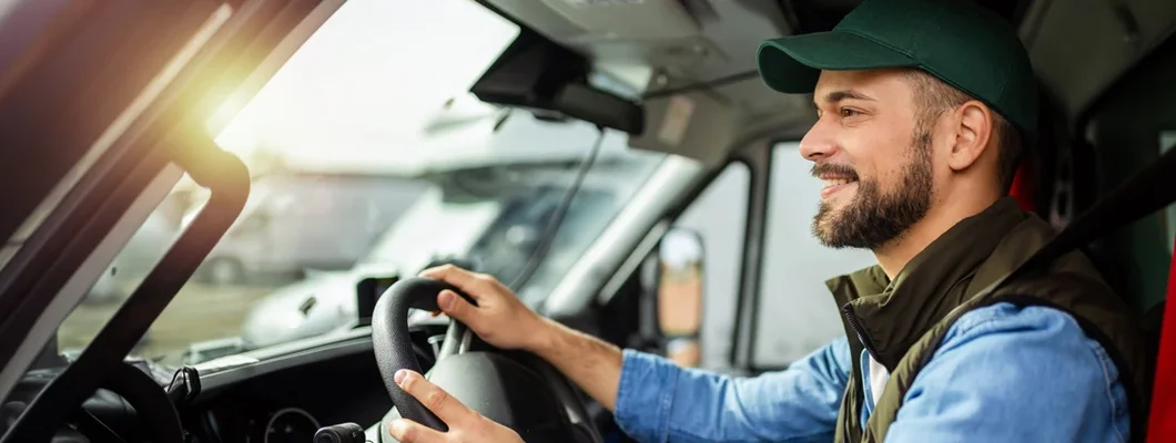 Man working in towing service and driving his truck. Find Nebraska Commercial Vehicle Insurance.