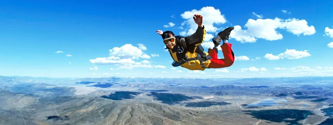 Man skydiving over Reno, Nevada. Find High Risk Life Insurance.