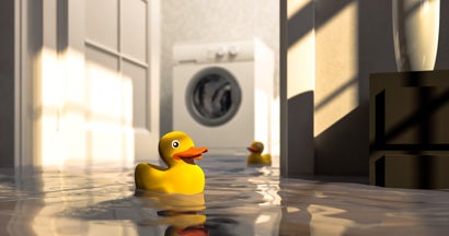 Water damage caused by defective washing machine. Flooded basement.