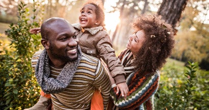 Happy parents having fun with their daughter at the park. What happens if you were denied life insurance?