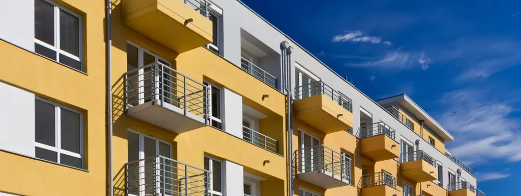 New modern apartment building with balconies. Find Lexington, Kentucky renters insurance.