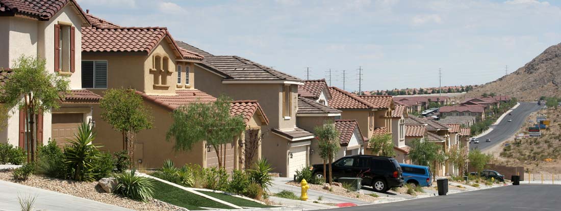 Southwest neighborhood homes and cars. Find Arizona umbrella insurance.