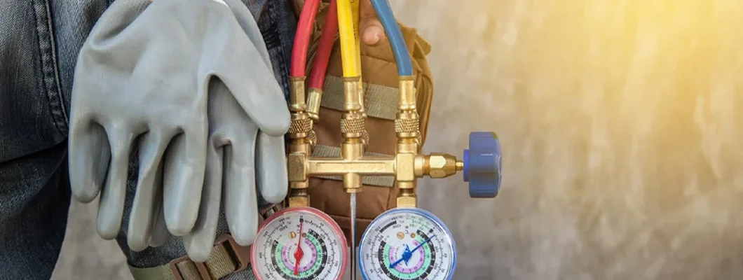 Air conditioning technician preparing to install new air conditioner. HVAC contractor insurance.