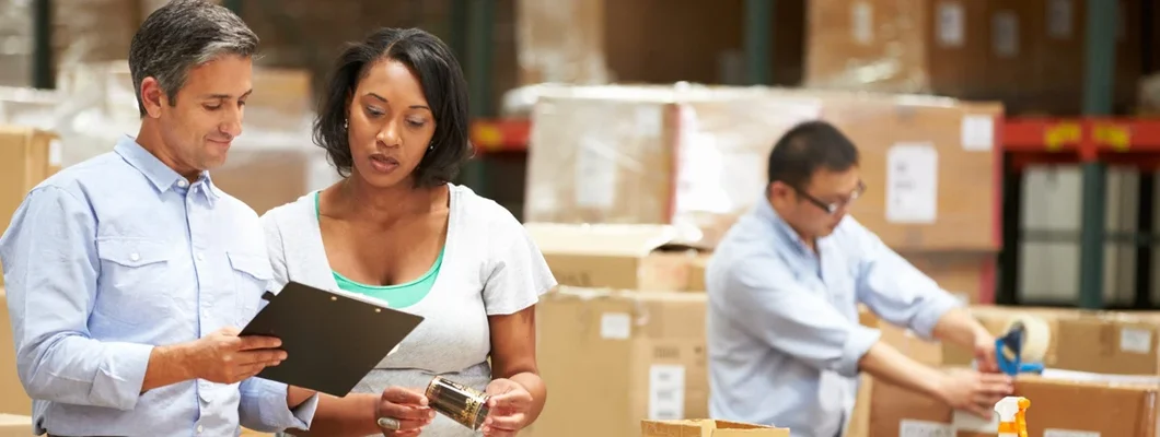 Workers In Warehouse Preparing Goods For Dispatch. Find Bozeman, Montana business insurance. 