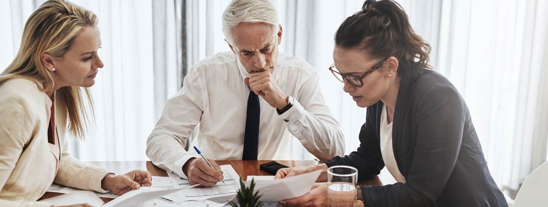 Couple discussing variable annuities with independent insurance agent. Common Myths about Variable Annuities.