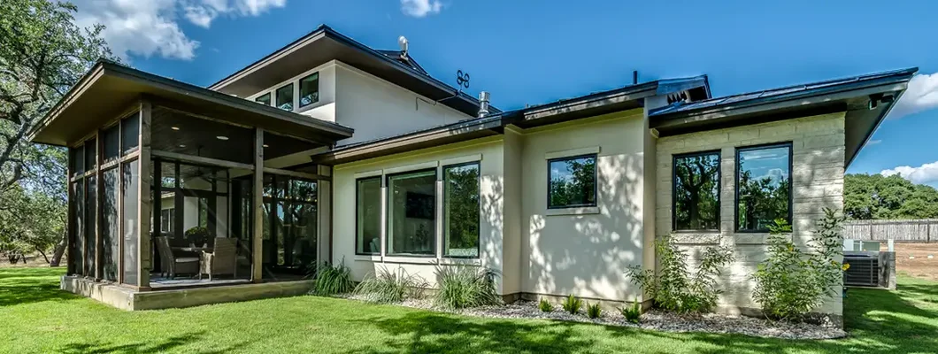 Back yard with sunroom enclosure on new home. Thompson's Station, Tennessee Homeowners Insurance.