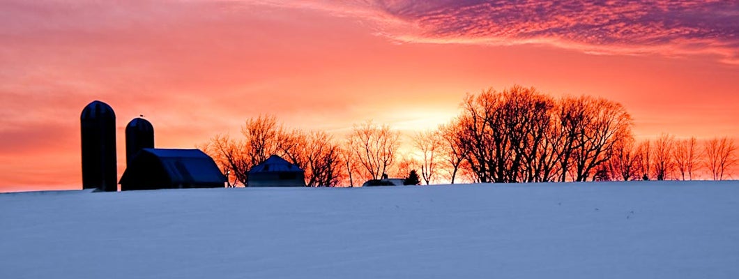 Minnesota farm in winter at sunset. Minnesota State Laws and Regs.