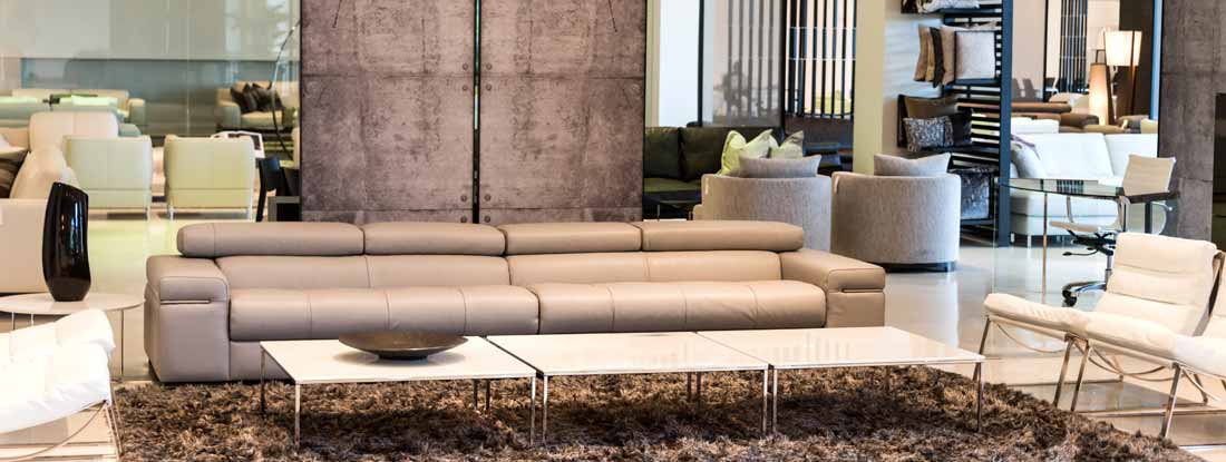 Living room in a furniture showroom. Find Furniture Store Insurance.