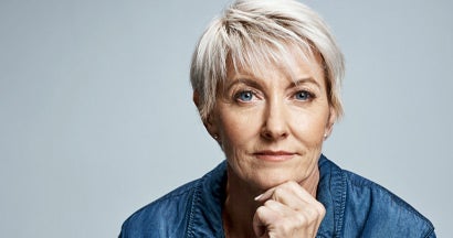 Professional female leaning forward. Single Life Annuity.