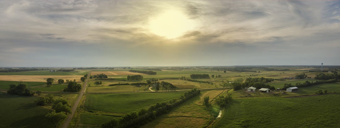 Rural landscape with agricultural fields, a major part of the economy in South Dakota. South Dakota State Laws and Regs.