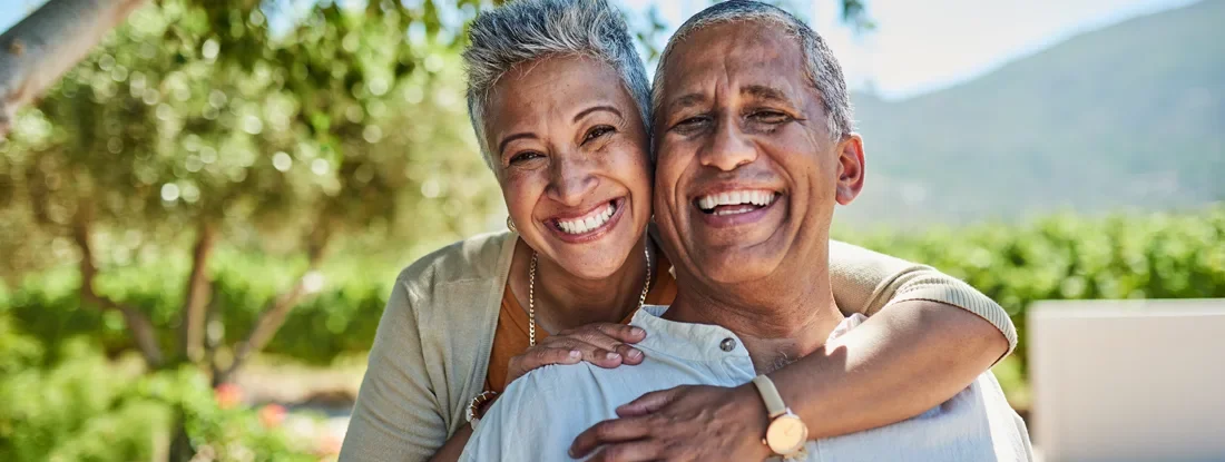 Senior Couple in Park. Life Insurance Annuities. 