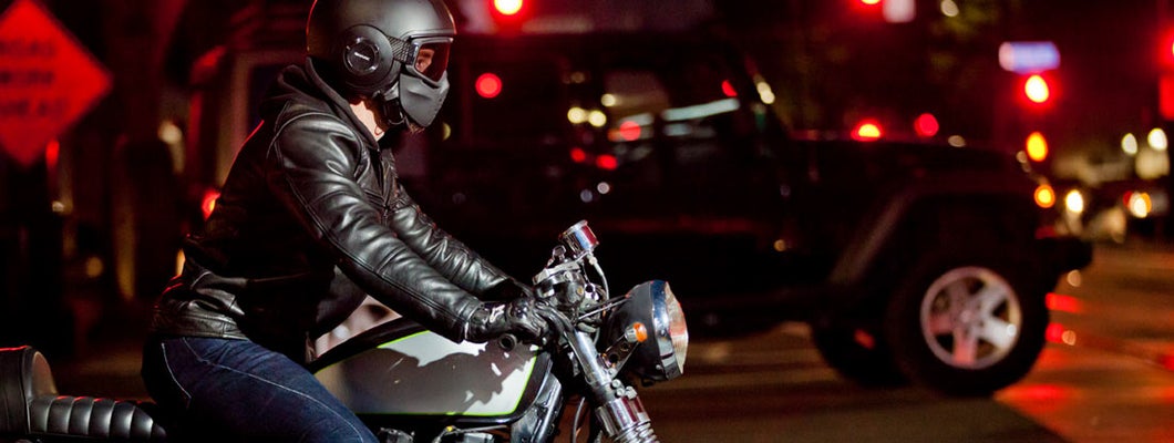 Motorcycle Rider at Night. Find New York motorcycle insurance.