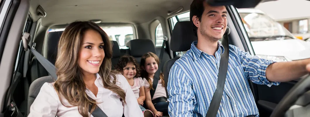 Happy family going for a ride in the car. How to Find the Best Car Insurance Policy in Lenexa, Kansas.