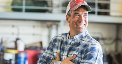 American man standing in a warehouse