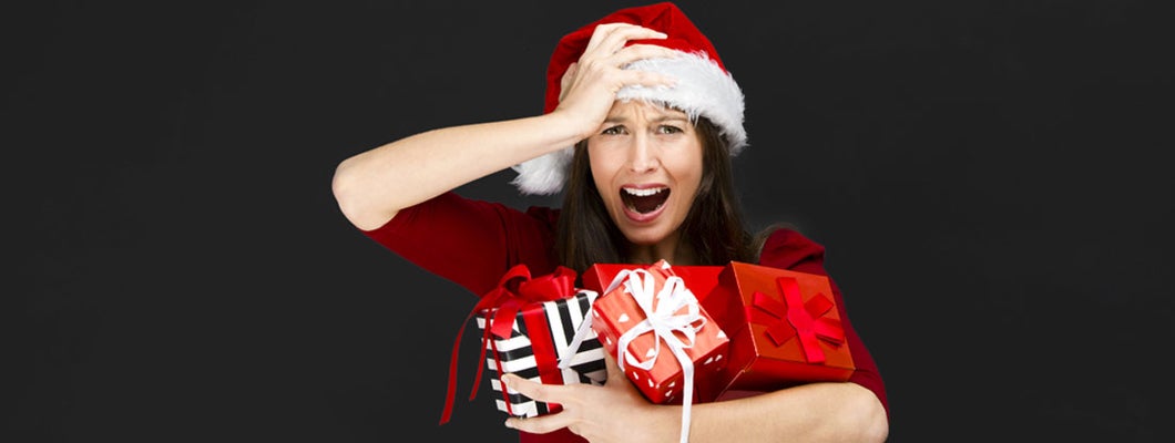 woman holding christmas gifts