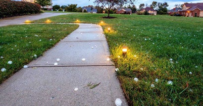 Baseball size hail covering the ground after the storm. Am I Covered if a Hail Storm Hits My Home and Car in Tennessee?