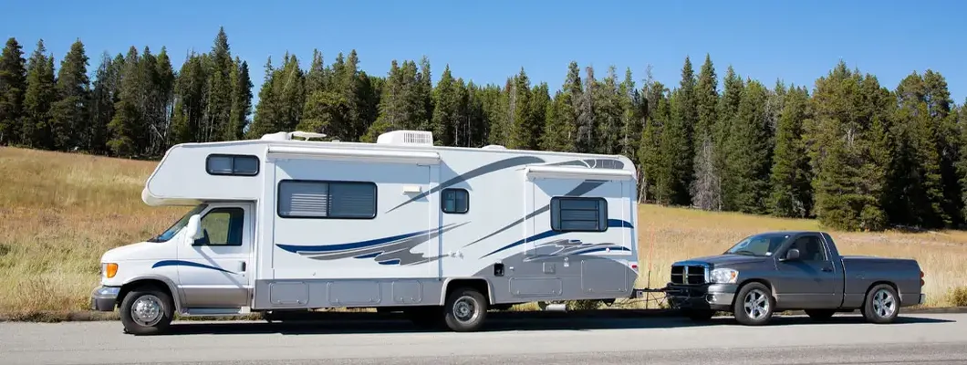 RV motorhome in Yellowstone National Park, Wyoming. The 5 Best Cars to Tow behind an RV. 