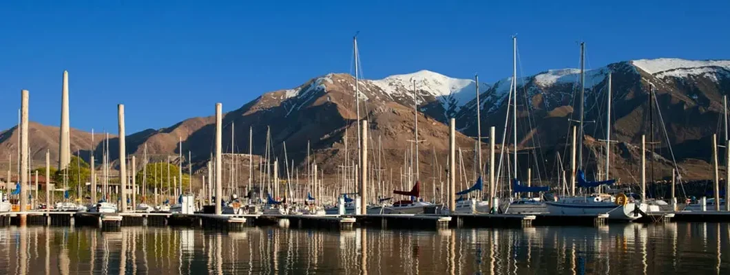 Sailboats docked in a marina on the Great Salt Lake, Utah. Find Utah Boat Insurance.