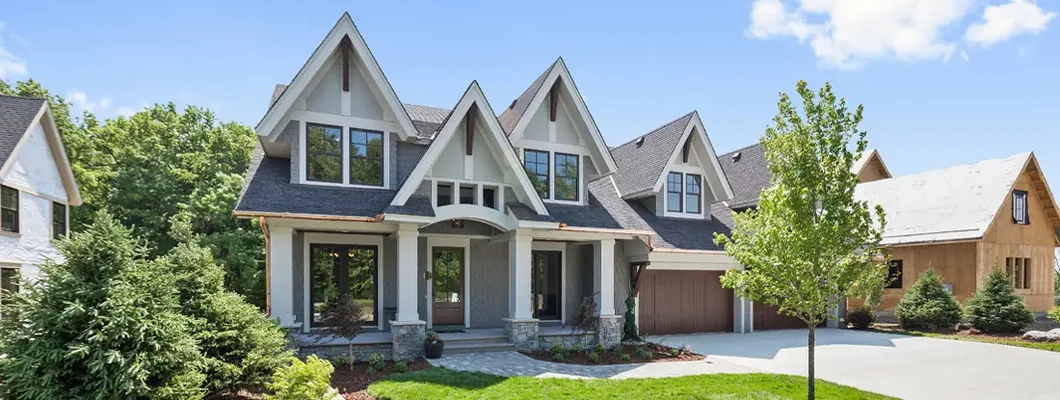 Craftsman home with immaculate landscaping. How to Find the Best Homeowners Insurance in Brookline, New Hampshire.