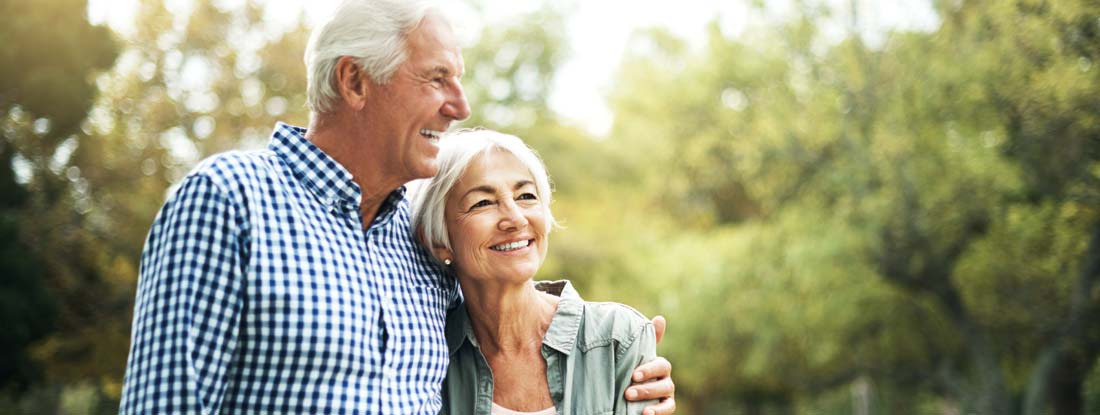 Senior couple spending a day in the park. Refund Life Annuity.