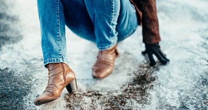 Woman slipped on ice covered sidewalk. Who's responsible for icy sidewalk injuries, me or the city?