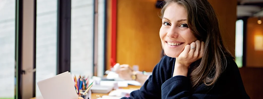 Designer working in an office. Helena, Montana Business Insurance.