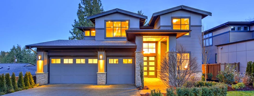 Modern two story tall house exterior. Find San Antonio Texas homeowners insurance.