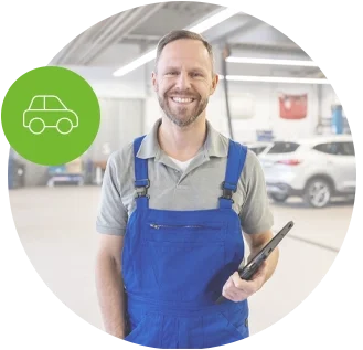 Auto Serviceman in Auto Shop. Find Auto Service Business Insurance.