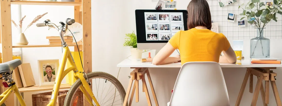 Woman working from a home office.  Does a Non-Risky Business Need Business Insurance?