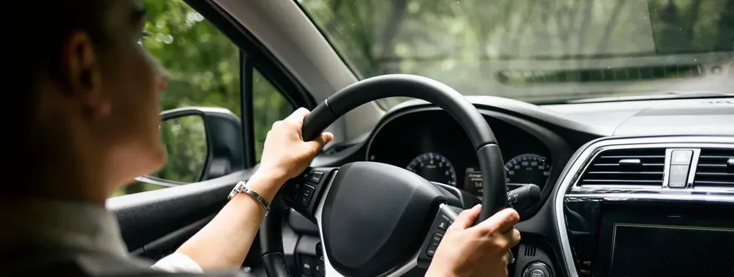 Man driving car. Find Bluffton, South Carolina car insurance.